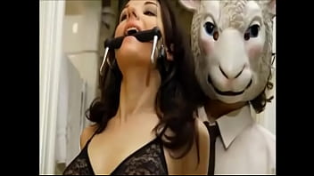 Gagged brunette moans