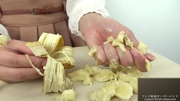 Hand crush fetish girl crush a banana by hand
