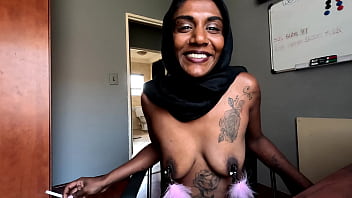 Desi in hijab smoking while wearing nipple clamps Desi in hijab smoking while wearing nipple clamps
