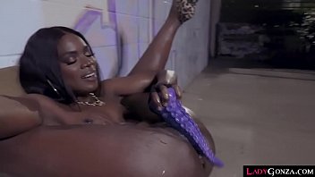 Joanna has a present for ana too and anas jaw drops when she sees what it is a massive purple dildo shaped like a t