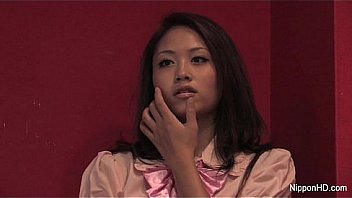 Asian babe gets nude