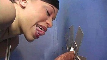 Ebony slut fucks a white gloryhole cock in her first interracial scene 17