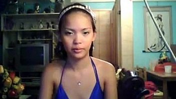 Asian girl shows off her small tits