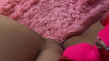 Lady in red lingerie plays with her puffy wet pussy