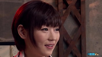 A slender asian female exhibits a high degree of submissiveness and endures much teasing and sexual activity