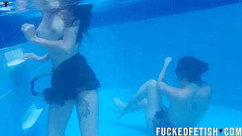 Two girls pool underwater getting horny