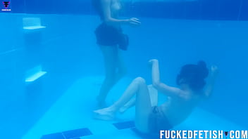 Two girls pool underwater getting horny