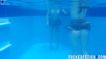 Two girls pool underwater getting horny