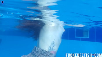 Two girls pool underwater getting horny
