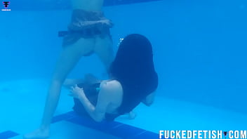Two girls pool underwater getting horny