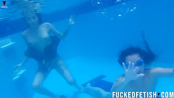 Two girls pool underwater getting horny
