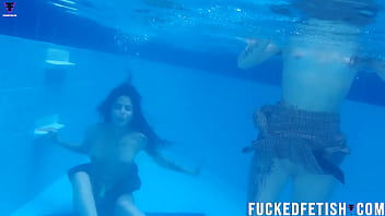 Two girls pool underwater getting horny