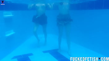 Two girls pool underwater getting horny