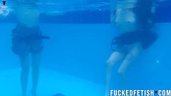 Two girls pool underwater getting horny
