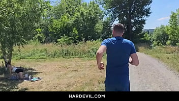 Cute emily pink jogs in a serene outdoor setting