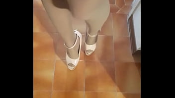 Milf with extreme high heels and pantyhose walking