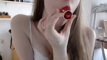 Hot woman plays with her ass with a toy