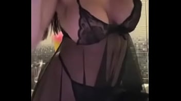 Milf with big tits wearing stockings