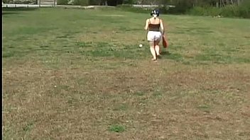 Innocent teen kitty playing softball outdoors