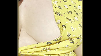 Milf exposes her perfect boobs in the automobile driving