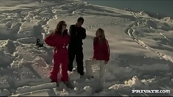 Members of the ski rescue patrol find a stranded skier and screw him