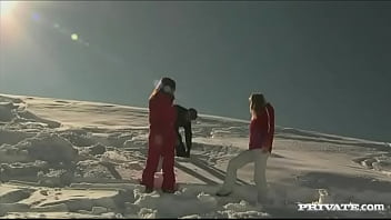 Members of the ski rescue patrol find a stranded skier and screw him