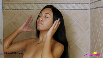 Gorgeous brunette enjoys a sensual bath