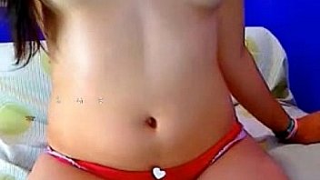 Petite young cam girl with small tits rubs tight pussy