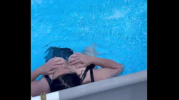 Titty action in the pool