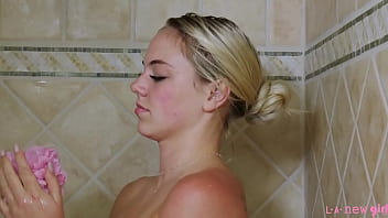 Glamorous blonde icon enjoys a sensual bath