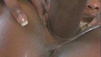 Oiled up hottie fucks a big black cock