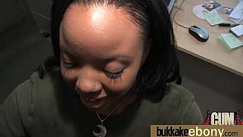 Ebony in a huge bukkake 22