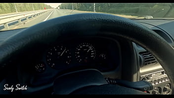 Pretty hitchhiker seduces driver and gives blowjob at 93 mph