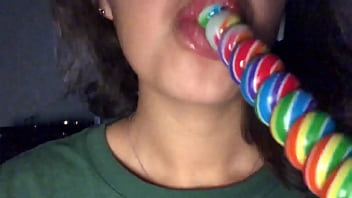 Girl Eating A Big Lollipop thumbnail
