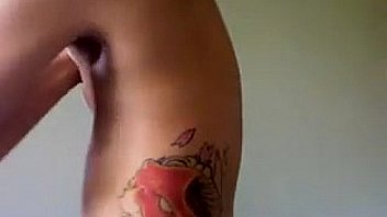 Pretty tattooed chick takes a shower