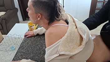 A stepdaughter is surprised while having breakfast