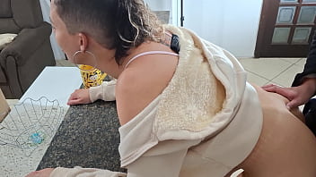 A stepdaughter is surprised while having breakfast