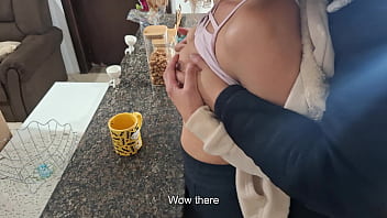 A stepdaughter is surprised while having breakfast