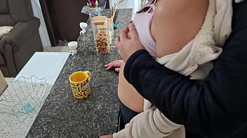 A stepdaughter is surprised while having breakfast