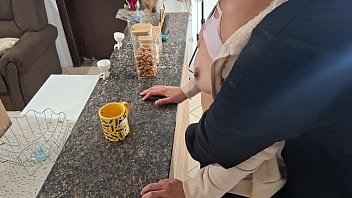 A stepdaughter is surprised while having breakfast