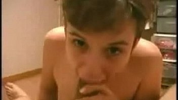 Sexy brunette strips before blowjob