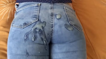 Stepmother masturbates very excited with her son and asks him to fill her big ass in jeans with milk