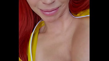 Milf wears transparent latex catsuit at pool