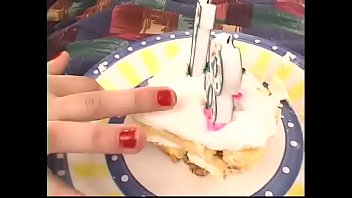The Best Presents For 18th Birthday Of Cute Darkhaired Girl Are Dildo Hard Dick And Special Festive Cake With Cream thumbnail