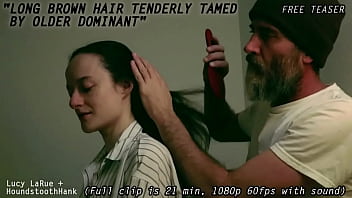 Long brown hair tenderly tamed by older dominant0
