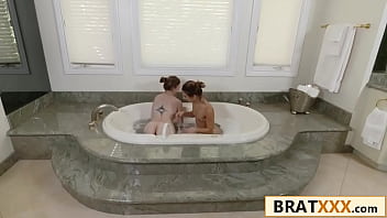 Oiled up tiny teens take turns on a thick rod in the dark