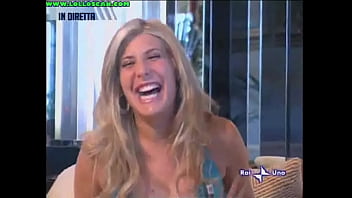 Live television panty oops upskirt as a hottie picks up a dog and leaves her underwear on display