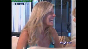 Live television panty oops upskirt as a hottie picks up a dog and leaves her underwear on display