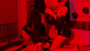 Lesbians between succubus and nun on halloween