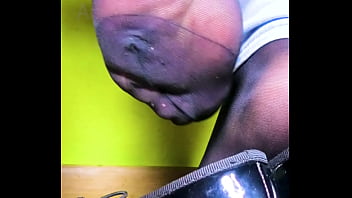 Young black haired girl shoeplay dipping lack lacquer black flats shoes and her stinky nylon